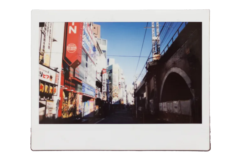 A film photo of a street in Tokyo.