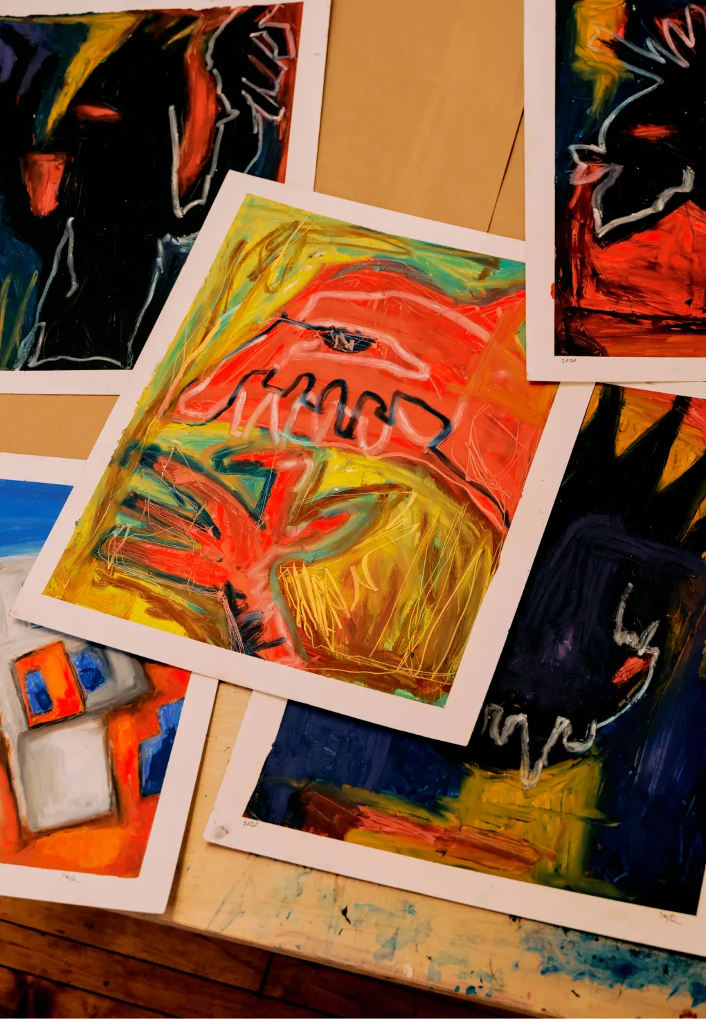 Multiple expressive paintings.